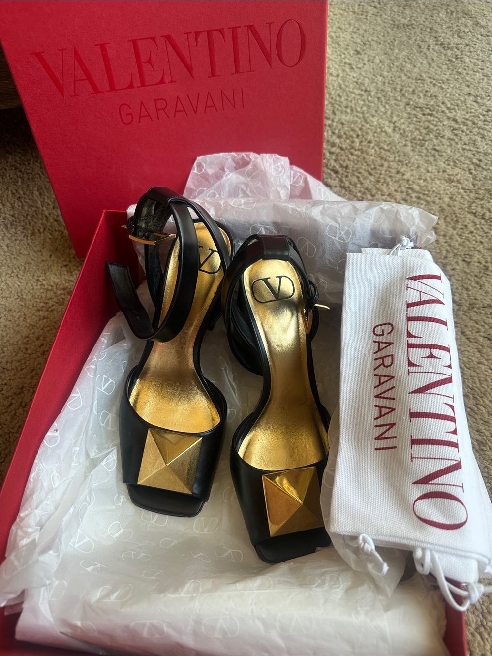 Valentino Garavani Black Leather Heels with Gold Pyramid Accent